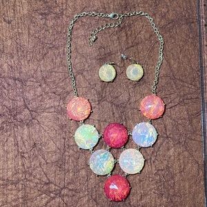 Pearlescent medallion necklace.